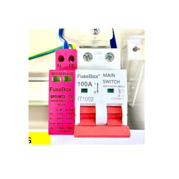 Close-up showing pink SPD and main switch inside a FuseBox F3 Series consumer unit