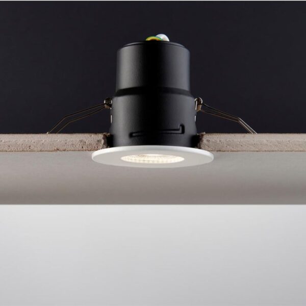 ShieldONE 65 GU10 downlight by Saxby – fire-rated recessed ceiling light with dimming support, IP65 rating, and interchangeable bezels.